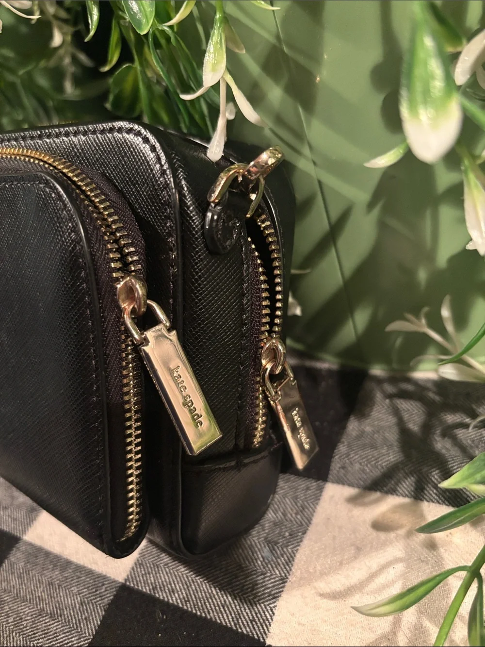 kate spade black saffiano leather zip-around wallet with gold logo